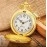 Золотистий кварцовий кишеньковий годинник у Палацовому стилі.